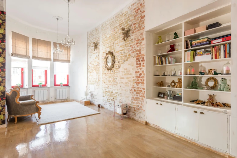 this is an empty living room with the walls painted a brick design