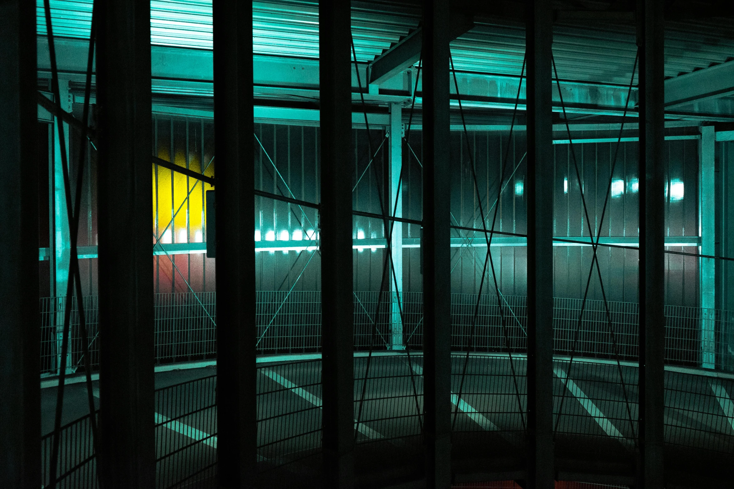 interior of empty industrial building lit with light