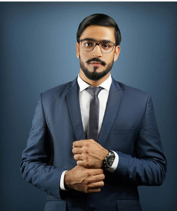 a man is in a suit, tie and glasses