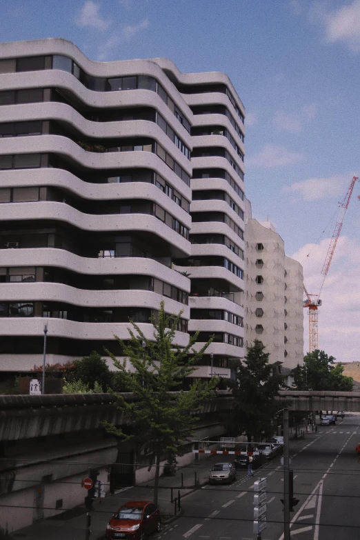 a tall building on the corner of a street