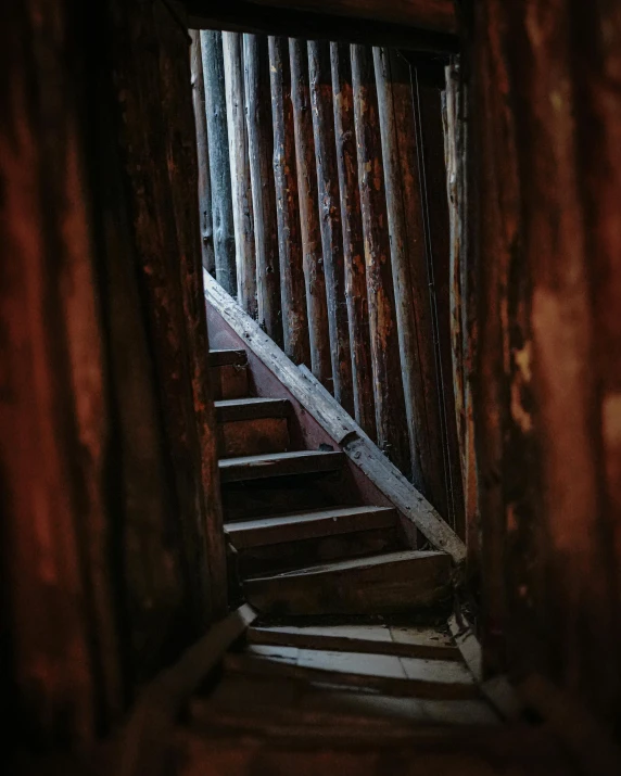 looking down the stairs of an old building