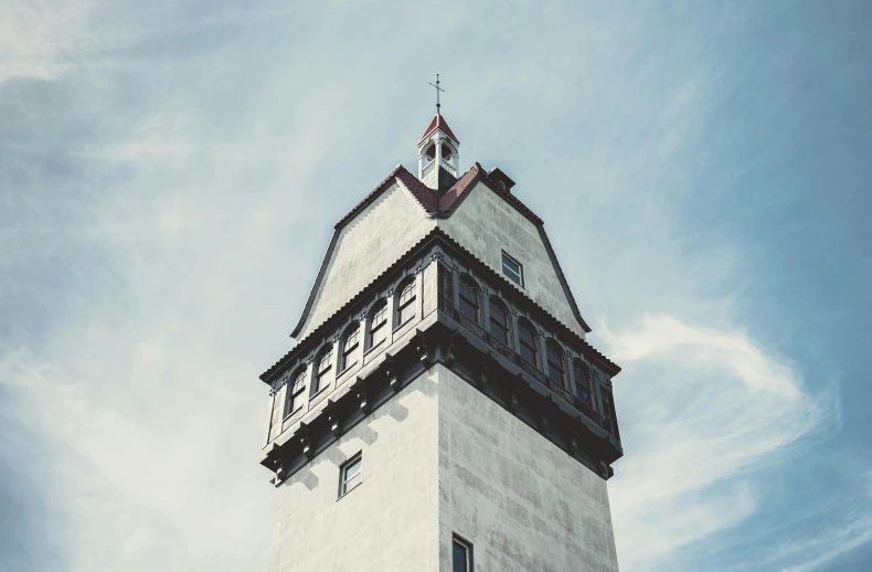 a tower is seen with the sky in the background