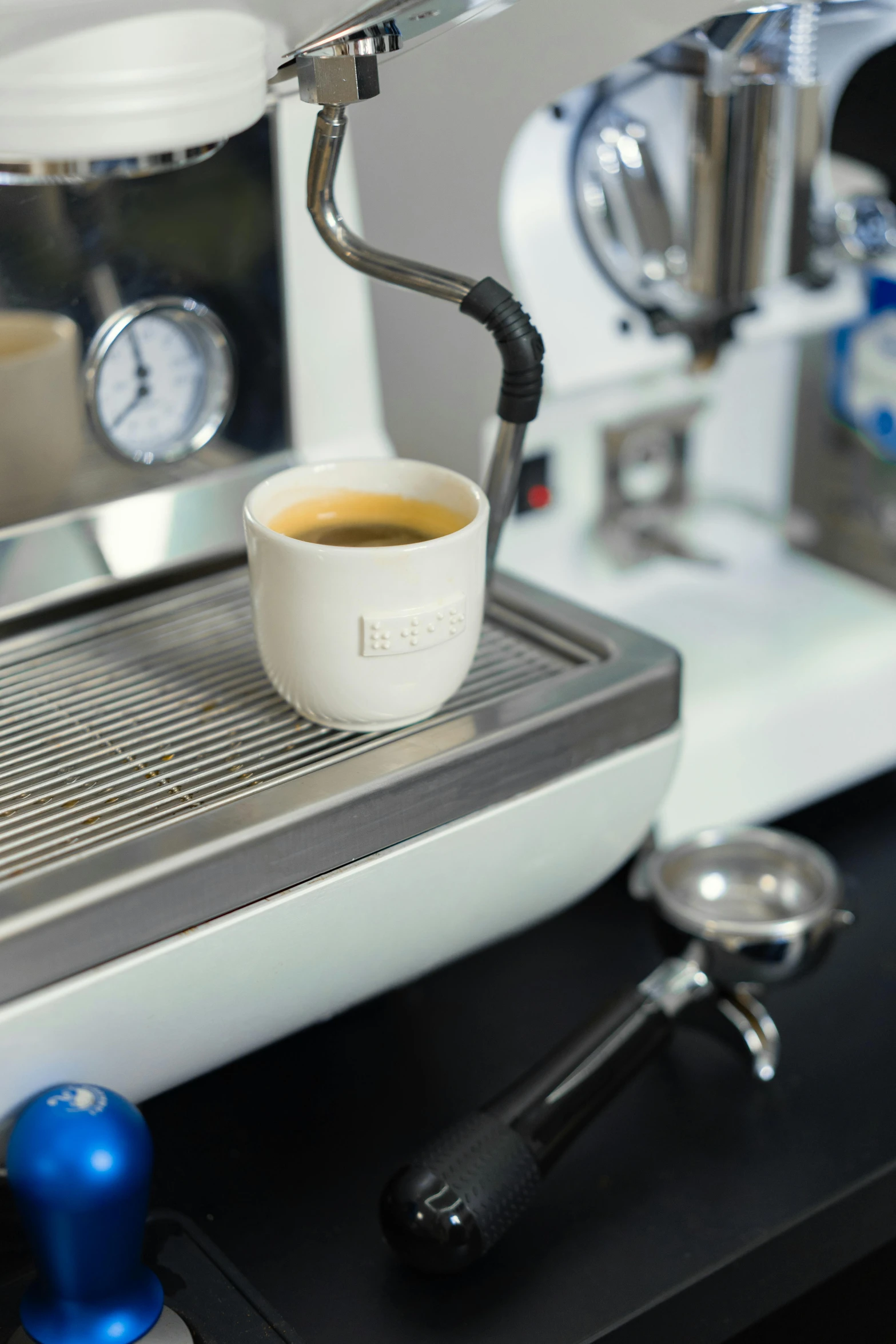 there is a coffee cup on a counter