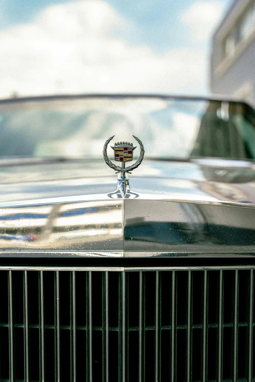 the front end of a classic car is pictured