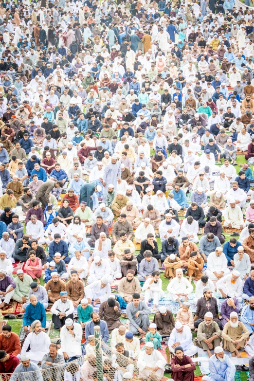 a large group of people are standing together