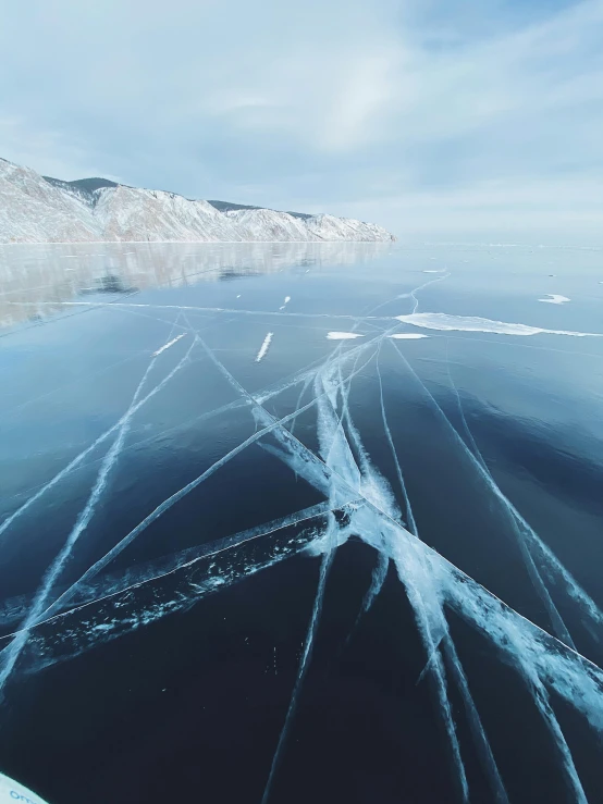 water and ice cover the surface of the sea