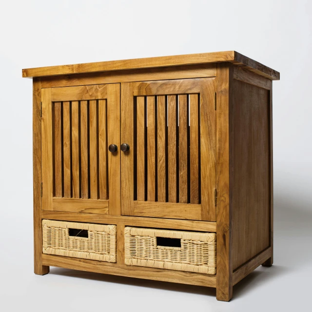 an ornate wooden storage cabinet with wicker baskets