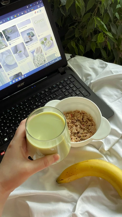 a woman holds a bowl of cereal with two bananas