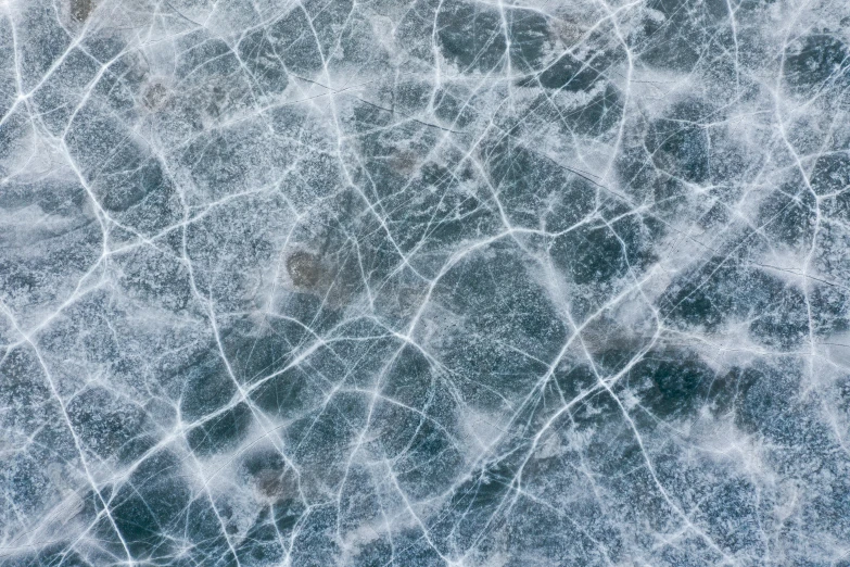 the pattern of ice on water, which appears to be frozen