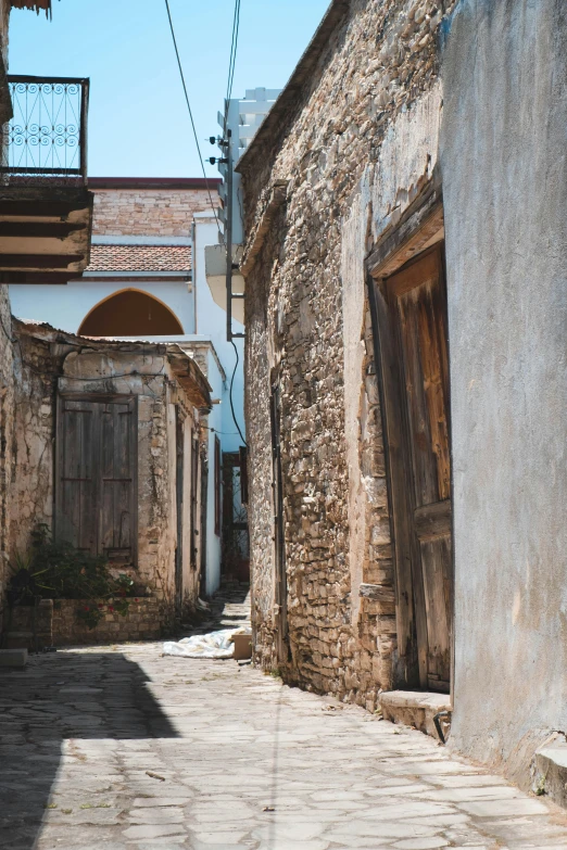 a couple of buildings with an open door on either side