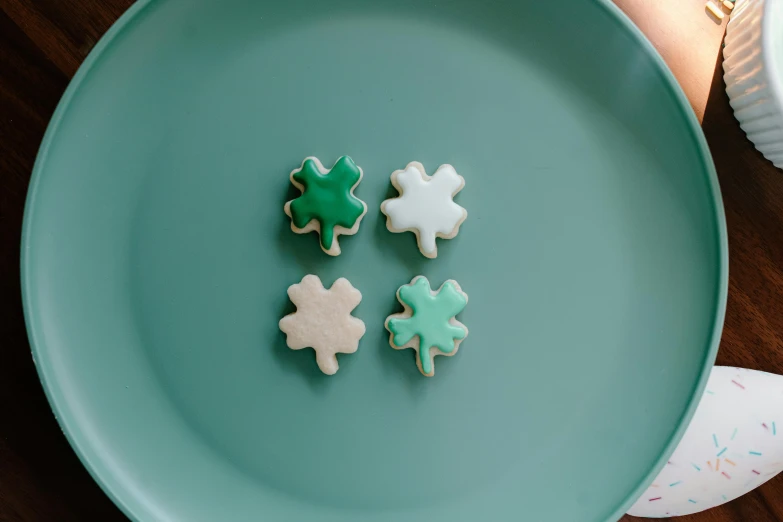 four pieces of cookie in the shape of a snowflake