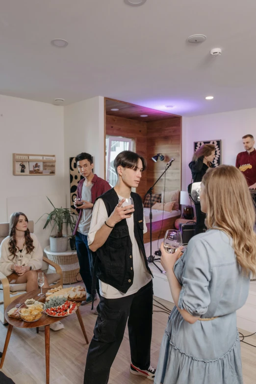 a woman is taking a selfie with some people