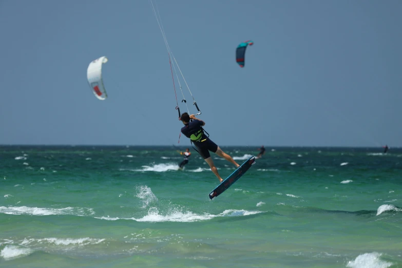 a person on surfboard riding in the ocean