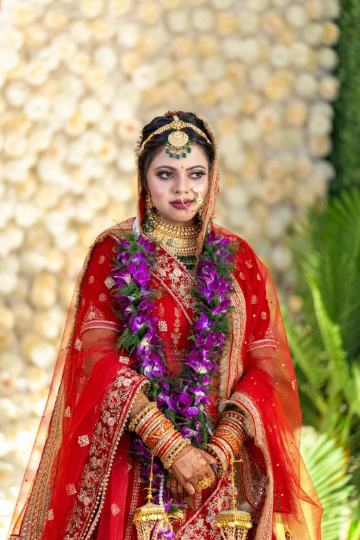 a woman in indian clothing in traditional garb