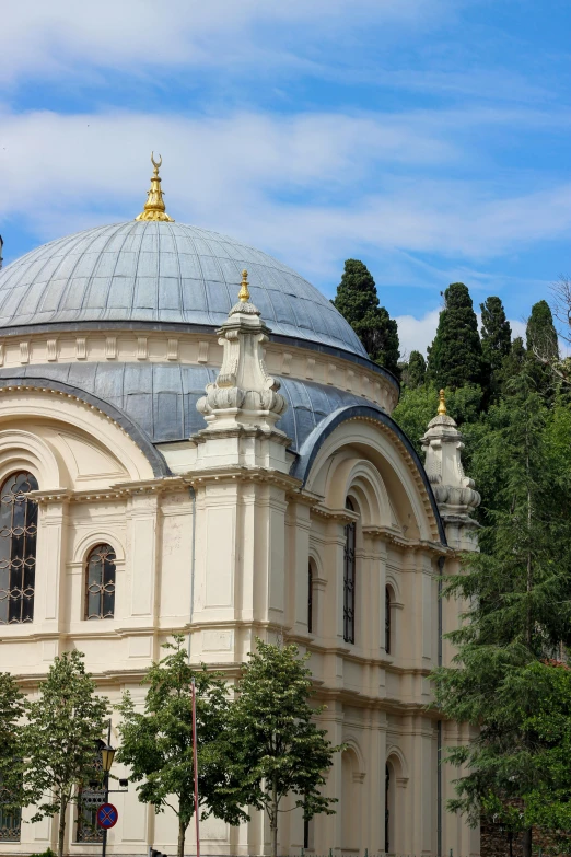 a large building with a dome is shown