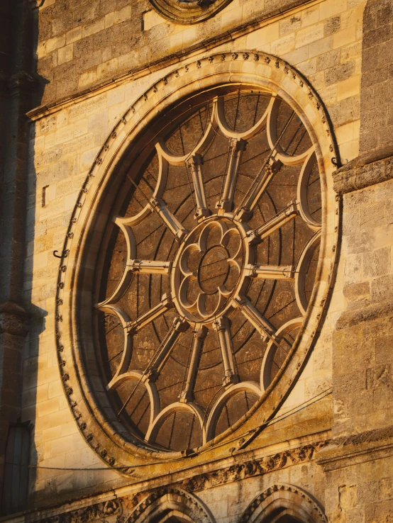 a building with a circular window and a clock on it