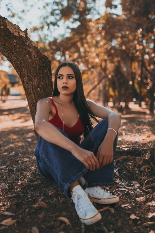 an image of a beautiful young woman in red shirt