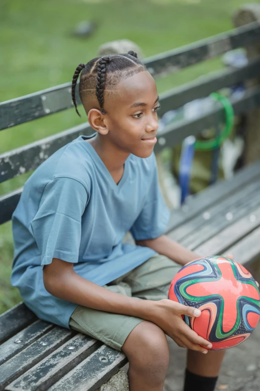 an image of a boy with a soccer ball