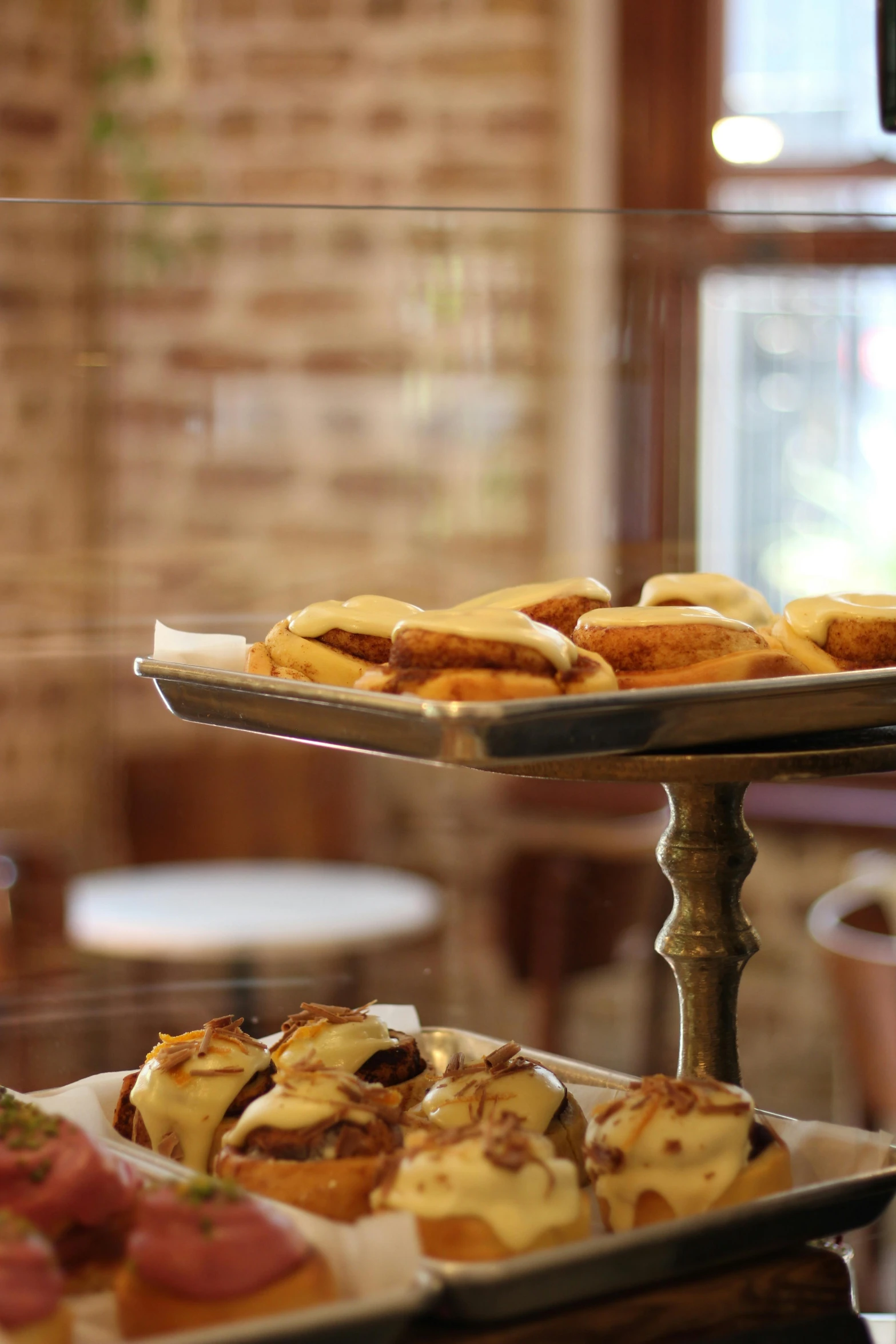 a dessert platter is on a table with a tray