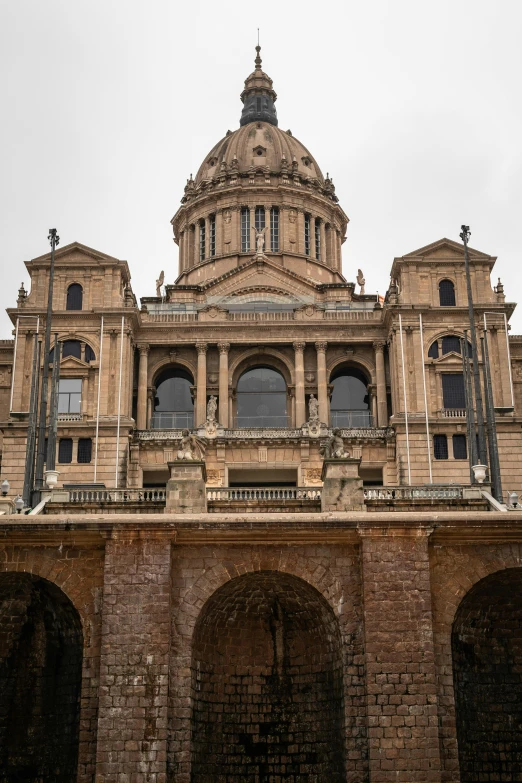 the top of a large building that has lots of windows on it