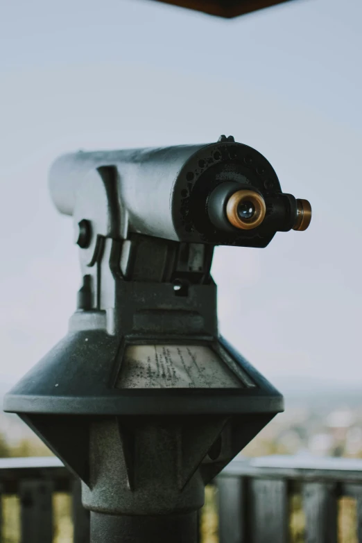 there is a telescope that is on a pole