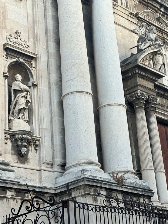 some columns are outside of a building