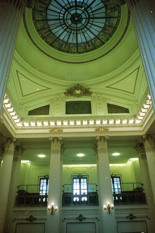 this looks like a huge building with two columns and a high dome above it