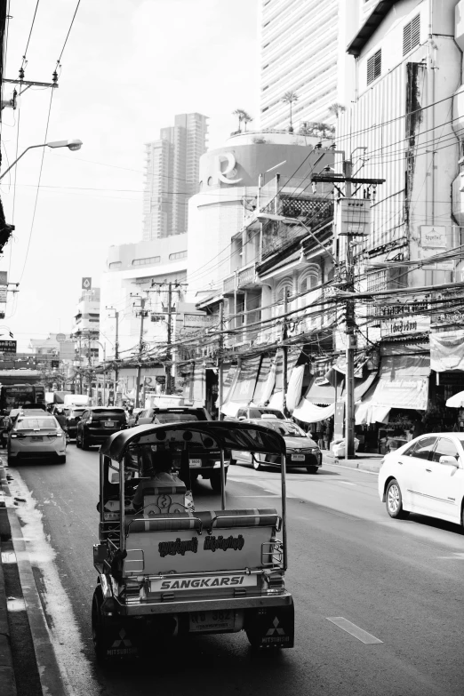 a busy city street with many vehicles in it