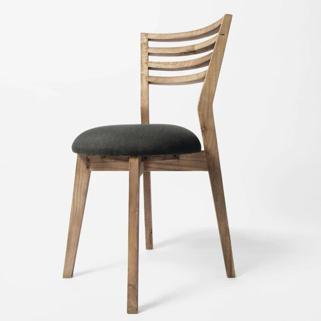 wooden chair with a green seat pad