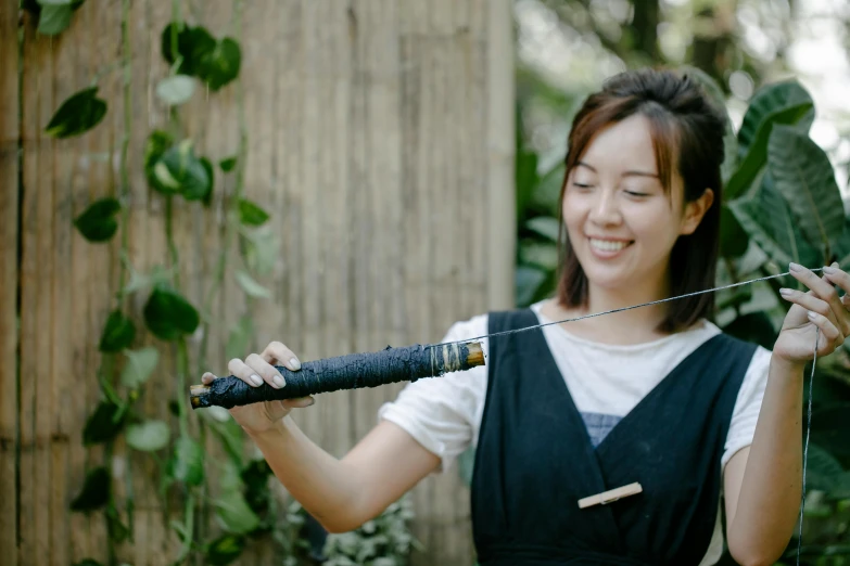 a woman holding a large knife in her hands