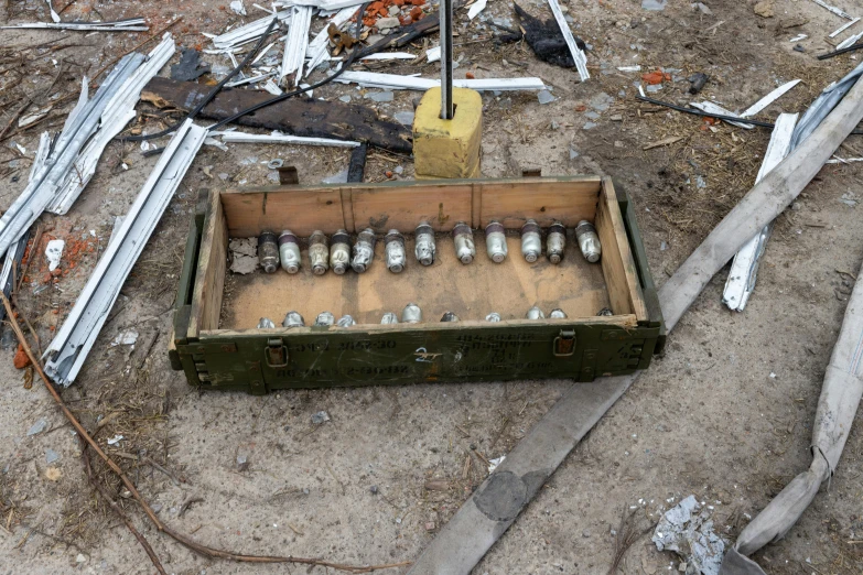 an old box full of silver bottle bottles