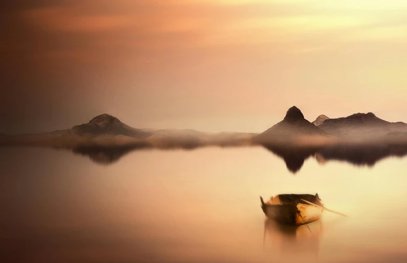 a boat in the water with rocks and a hill in the distance