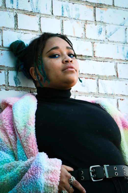 a young woman with a scarf around her neck