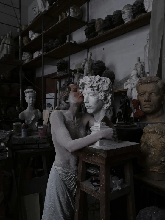 this is an image of a woman making sculptures