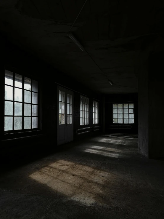 sunlight is shining in the windows on the walls of an old, deserted building