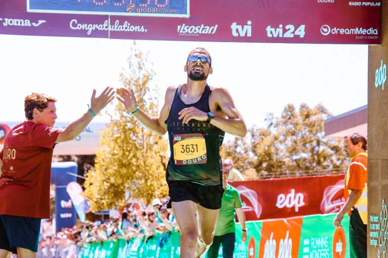 an older male jogging in a race