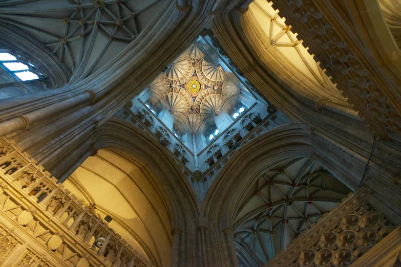 the inside of a large building with a large chandelier above it