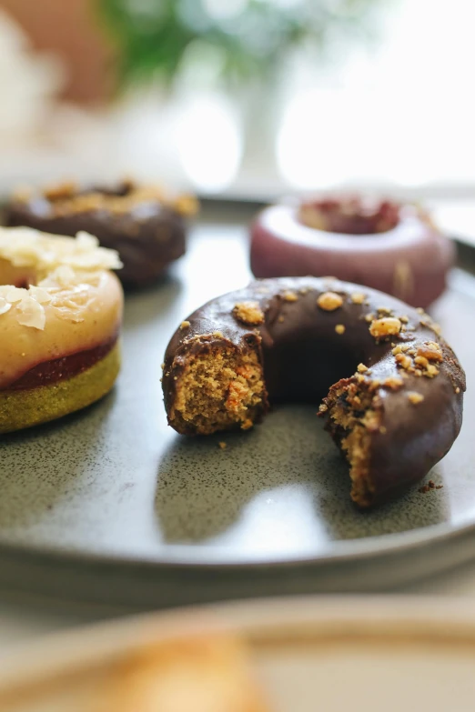 a plate with some cookies and pastries on it