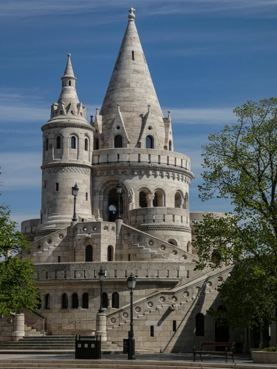 a large castle like building next to trees