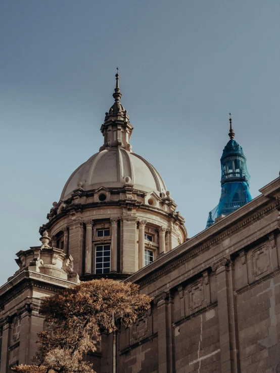 two large towers are in the center of a building