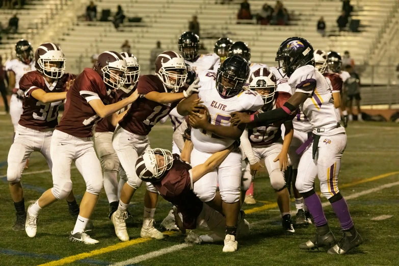 an image of a football game with a bunch of people