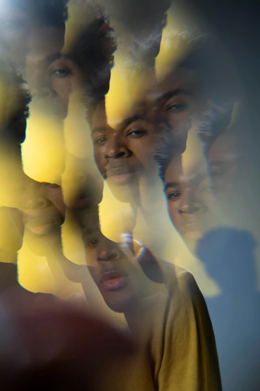 several people stand in front of the camera with their faces blurred