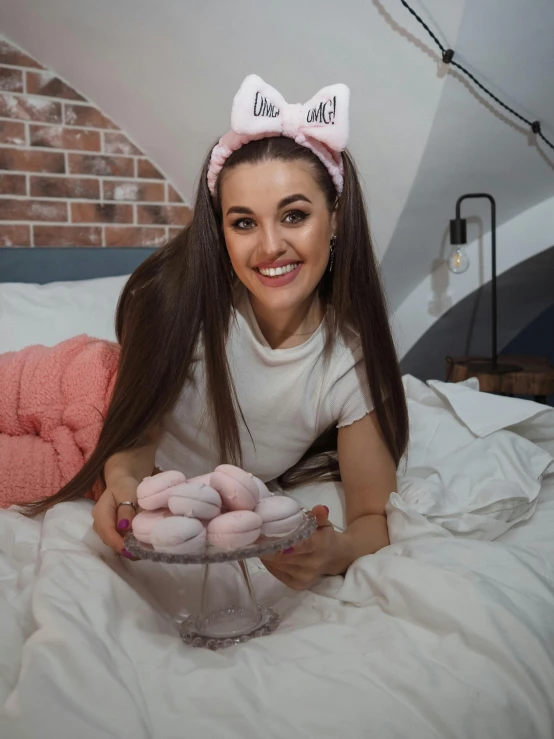 a girl with her feet on a cake tray