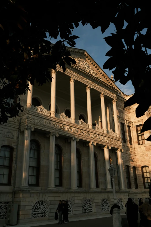 a building with columns, pillars and steps