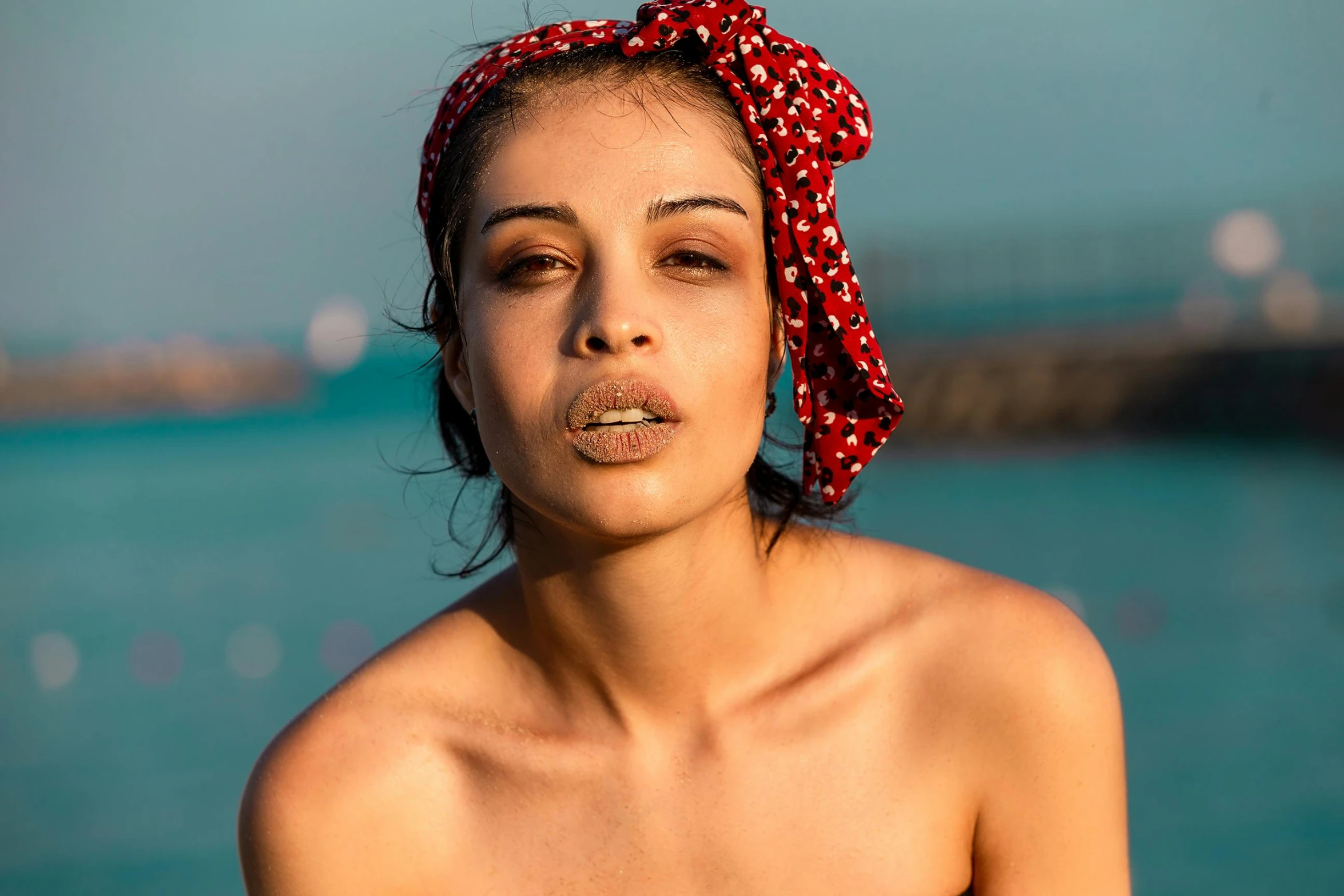 an image of a woman wearing a bandana