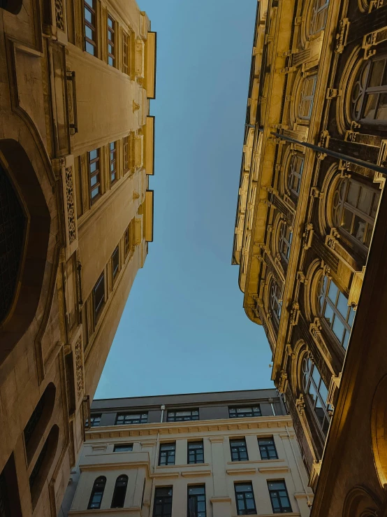 tall buildings with a streetlight in between them