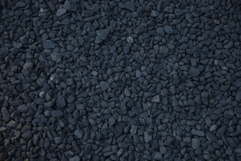 a bunch of rocks in the middle of a road