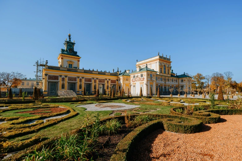 the courtyard and front of an ornate house