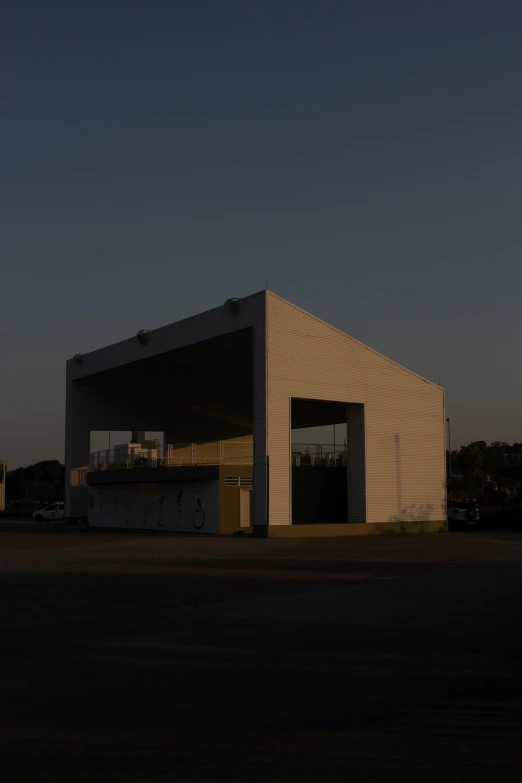 an outside building with a view of the sunset