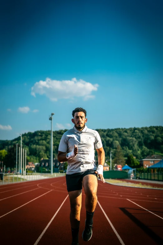 a man on the run in shorts and shorts